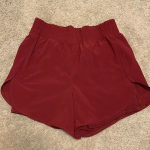 Athletic shorts with built in spandex and pockets